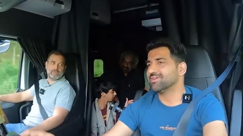 Rahul Gandhi with Taljinder Singh Gill. Rahul Gandhi with Taljinder Singh Gill.