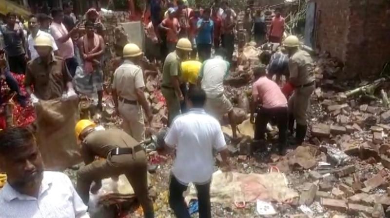 North 24 Parganas: Rescue operation underway after a blast at a firecraker factory at Duttapukur, in North 24 Parganas district, Sunday, Aug. 27, 2023. At least 3 people were killed and several others suffered injuries, according to police. (PTI Photo)(
