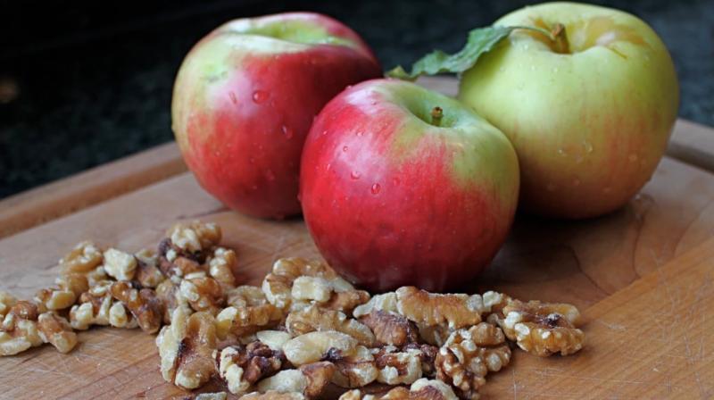 Apple and walnuts. Apple and walnuts.