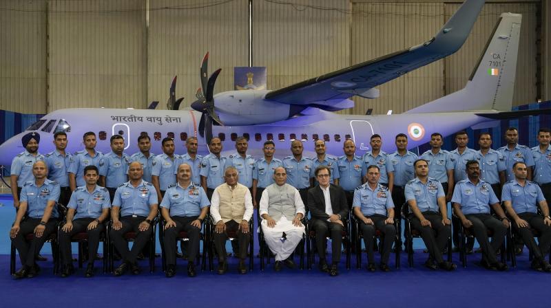Hindon: Union Defence Minister Rajnath Singh with MoS VK Singh, IAF chief Air Chief Marshal V R Chaudhari and other IAF officers in a group photograph during formal induction of C-295 MW transport aircraft into Indian Air Force at the Hindon Air Force Station, Monday, Sept. 25, 2023. (PTI Photo/Vijay Verma) Hindon: Union Defence Minister Rajnath Singh with MoS VK Singh, IAF chief Air Chief Marshal V R Chaudhari and other IAF officers in a group photograph during formal induction of C-295 MW transport aircraft into Indian Air Force at the Hindon Air Force Station, Monday, Sept. 25, 2023. (PTI Photo/Vijay Verma)