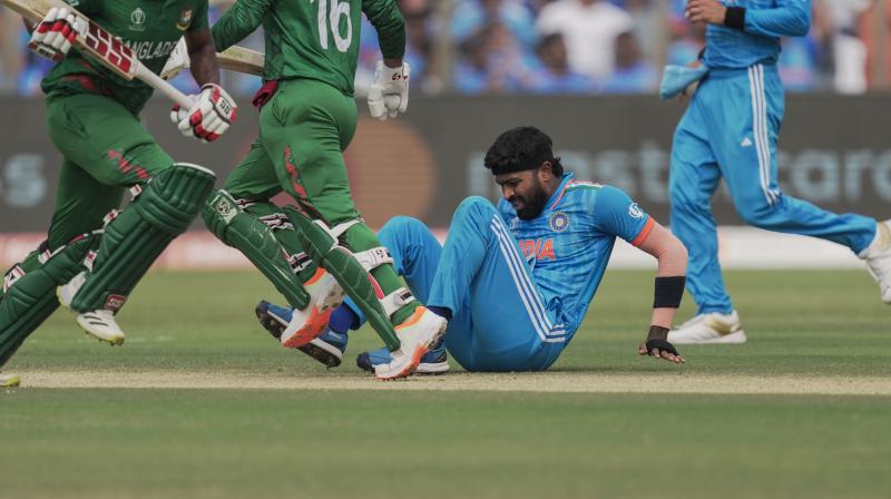 Pune: India's Hardik Pandya reacts after he suffered an injury during the ICC Men's Cricket World Cup 2023 match between India and Bangladesh, at Maharashtra Cricket Association Stadium in Pune, Thursday, Oct. 19, 2023. (PTI Photo/Kunal Patil) Pune: India's Hardik Pandya reacts after he suffered an injury during the ICC Men's Cricket World Cup 2023 match between India and Bangladesh, at Maharashtra Cricket Association Stadium in Pune, Thursday, Oct. 19, 2023. (PTI Photo/Kunal Patil)