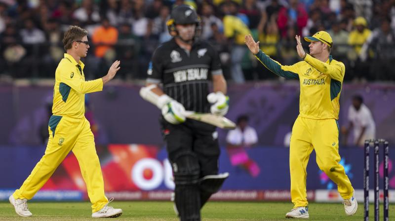 Dharamshala: Australia's Adam Zampa celebrates after taking the wicket of New Zealand's Tom Latham during the ICC Men’s Cricket World Cup 2023 match between Australia and New Zealand, at HPCA Stadium, in Dharamshala, Saturday, Oct. 28, 2023. (PTI Photo/Ravi Choudhary) Dharamshala: Australia's Adam Zampa celebrates after taking the wicket of New Zealand's Tom Latham during the ICC Men’s Cricket World Cup 2023 match between Australia and New Zealand, at HPCA Stadium, in Dharamshala, Saturday, Oct. 28, 2023. (PTI Photo/Ravi Choudhary)