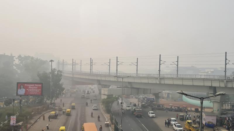 New Delhi: Vehicles near Anand Vihar area amid hazy weather conditions, in New Delhi, Sunday, Nov. 5, 2023. The air quality index deteriorated from 415 at 4 pm on Saturday to 460 at 7 am on Sunday. (PTI Photo) New Delhi: Vehicles near Anand Vihar area amid hazy weather conditions, in New Delhi, Sunday, Nov. 5, 2023. The air quality index deteriorated from 415 at 4 pm on Saturday to 460 at 7 am on Sunday. (PTI Photo)