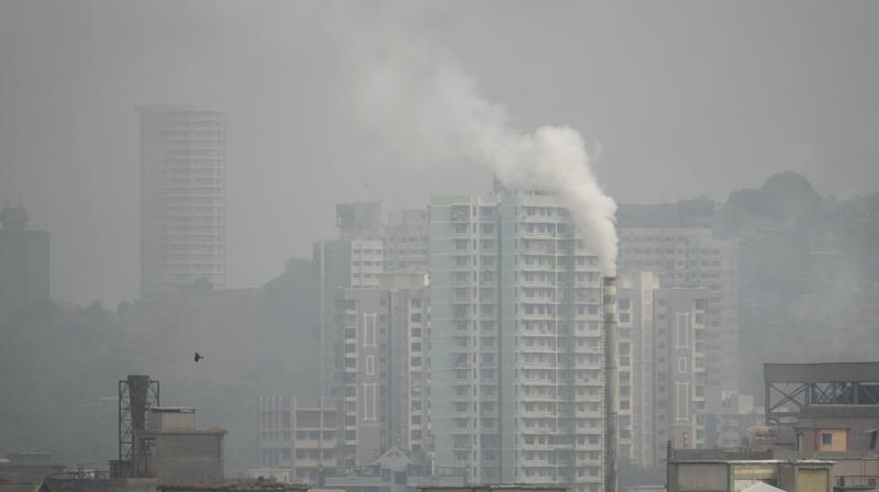 Mumbai: Smoke billows from a chimney as smog engulfs the city of Mumbai, Wednesday, Nov. 8, 2023. (PTI Photo/Kunal Patil)