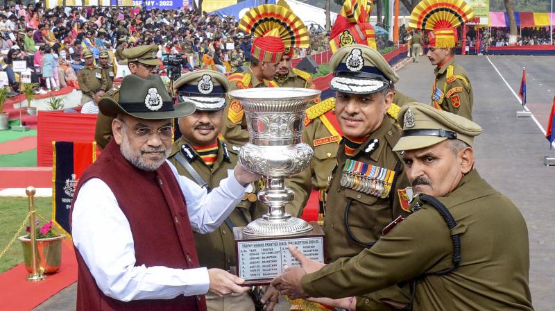 Hazaribagh: Union Home Minister Amit Shah felicitates BSF officers during the 59th Raising Day of the Border Security Force (BSF) at Meru Camp, in Hazaribagh district, Friday, Dec. 1, 2023. (PTI Photo) 