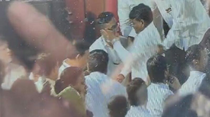 Video grab of BJP MLA slaps Police constable