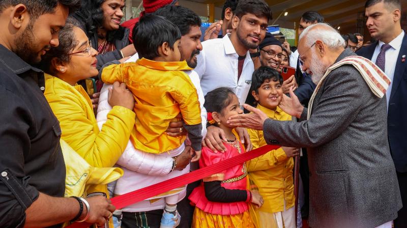 New Delhi: Prime Minister Narendra Modi greets people during a programme organised on the occasion of Pongal festival, in New Delhi, Sunday, Jan. 14, 2024. (PTI Photo) New Delhi: Prime Minister Narendra Modi greets people during a programme organised on the occasion of Pongal festival, in New Delhi, Sunday, Jan. 14, 2024. (PTI Photo)