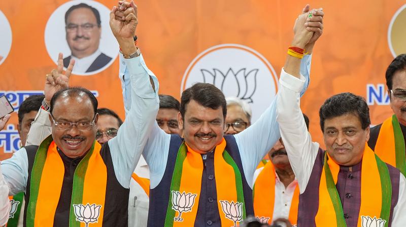 Mumbai: Former Maharashtra CM and Congress leader Ashok Chavan after joining BJP in presence of Maharashtra Deputy Chief Minister Devendra Fadnavis and Maharashtra BJP President Chandrashekar Bawankule, in Mumbai, Tuesday, Feb. 13, 2024. (PTI Photo/Shashank Parade)