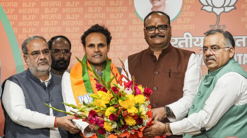 New Delhi: Lok Sabha MP from Ambedkar Nagar Ritesh Pandey joins BJP in presence of UP Dy CM Brajesh Pandey and other BJP leaders, in New Delhi, Sunday, Feb. 25, 2024. (PTI Photo/Kamal Kishore) New Delhi: Lok Sabha MP from Ambedkar Nagar Ritesh Pandey joins BJP in presence of UP Dy CM Brajesh Pandey and other BJP leaders, in New Delhi, Sunday, Feb. 25, 2024. (PTI Photo/Kamal Kishore)