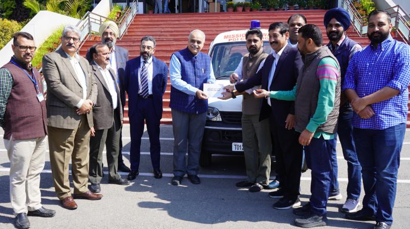 Mr. Rajwinder Singh, President of Mission Sewa, Chandigarh along with his dedicated team, presented the keys and documents of the ambulance to Prof. Vivek Lal, Director of PGIMER. Mr. Rajwinder Singh, President of Mission Sewa, Chandigarh along with his dedicated team, presented the keys and documents of the ambulance to Prof. Vivek Lal, Director of PGIMER.