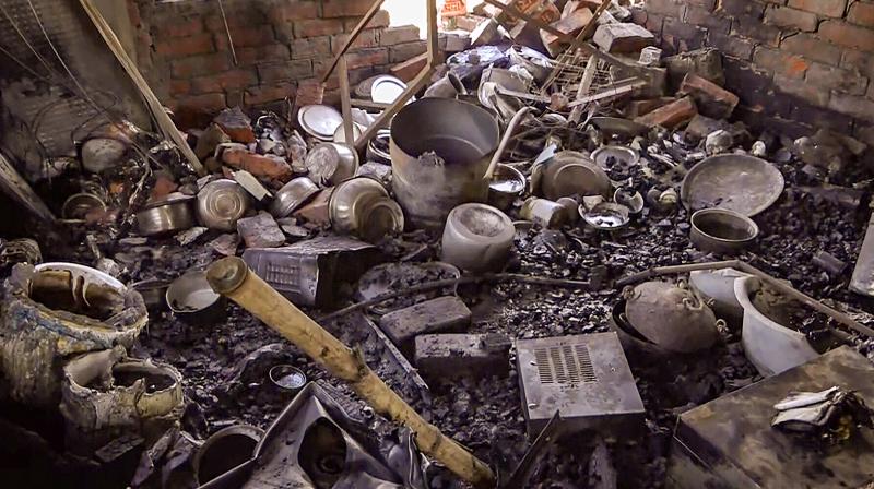 Lucknow: Remains of damaged commodities after two LPG cylinders exploded in a house, in Lucknow, Wednesday, March 6, 2024. Five people were killed and four others suffered injuries, according to police. (PTI Photo)