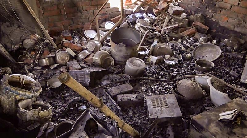 Lucknow: Remains of damaged commodities after two LPG cylinders exploded in a house, in Lucknow, Wednesday, March 6, 2024. Five people were killed and four others suffered injuries, according to police. (PTI Photo) Lucknow: Remains of damaged commodities after two LPG cylinders exploded in a house, in Lucknow, Wednesday, March 6, 2024. Five people were killed and four others suffered injuries, according to police. (PTI Photo)