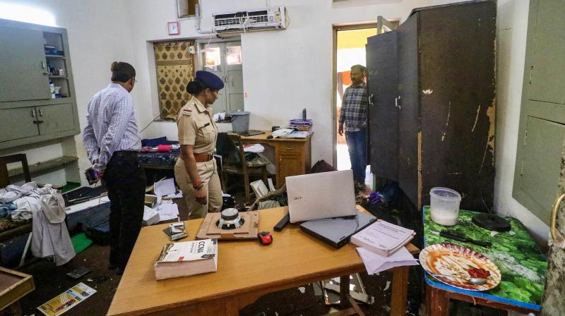 Ahmedabad: Police investigate the Gujarat University hostel campus where students hailing from different foreign countries were assaulted allegedly by a group of persons over the issue of offering Namaz, in Ahmedabad. (File Photo PTI) Ahmedabad: Police investigate the Gujarat University hostel campus where students hailing from different foreign countries were assaulted allegedly by a group of persons over the issue of offering Namaz, in Ahmedabad. (File Photo PTI)