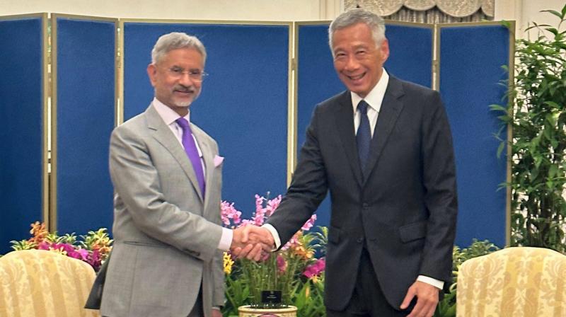 Singapore: External Affairs Minister S. Jaishankar with Singapore's Prime Minister Lee Hsien Loong during a meeting, in Singapore. (PTI Photo)