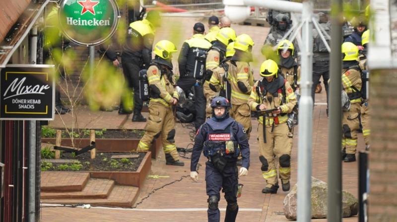 Police and emergency services gather as several people have been taken hostage in Ede. Police and emergency services gather as several people have been taken hostage in Ede.