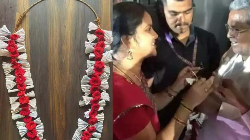 The student presented a garland made of free bus tickets to Chief Minister Siddaramaiah The student presented a garland made of free bus tickets to Chief Minister Siddaramaiah