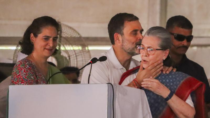 Rae Bareli: Congress leader and party candidate from Rae Bareli constituency Rahul Gandhi greets his mother and party leader Sonia Gandhi during a public meeting for the Lok Sabha elections, in Rae Bareli district, Friday, May 17, 2024. Congress leader Priyanka Gandhi is also seen. (PTI Photo) Rae Bareli: Congress leader and party candidate from Rae Bareli constituency Rahul Gandhi greets his mother and party leader Sonia Gandhi during a public meeting for the Lok Sabha elections, in Rae Bareli district, Friday, May 17, 2024. Congress leader Priyanka Gandhi is also seen. (PTI Photo)