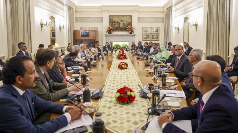 New Delhi: Prime Minister Narendra Modi with Prime Minister of Bangladesh Sheikh Hasina and other dignitaries during a delegation-level meeting, in New Delhi, Saturday, June 22, 2024. (PTI Photo) New Delhi: Prime Minister Narendra Modi with Prime Minister of Bangladesh Sheikh Hasina and other dignitaries during a delegation-level meeting, in New Delhi, Saturday, June 22, 2024. (PTI Photo)