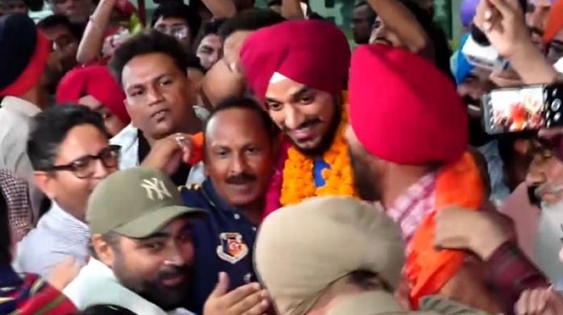 Arshdeep Singh with fans. Arshdeep Singh with fans.