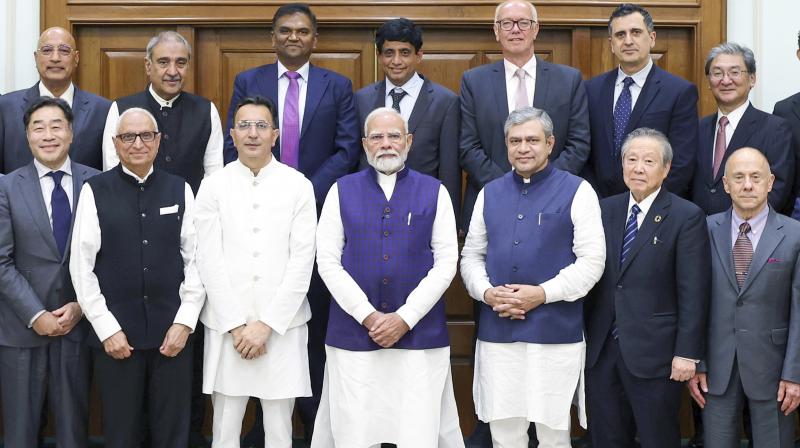 New Delhi: Prime Minister Narendra Modi with Union IT Minister Ashwini Vaishnaw, Mos Jitin Prasada and executives after chairing the Semiconductor Executives' roundtable ahead of the Semicon India, in New Delhi, Tuesday, Sept. 10, 2024. (PTI Photo) New Delhi: Prime Minister Narendra Modi with Union IT Minister Ashwini Vaishnaw, Mos Jitin Prasada and executives after chairing the Semiconductor Executives' roundtable ahead of the Semicon India, in New Delhi, Tuesday, Sept. 10, 2024. (PTI Photo)