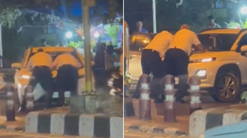 Delhi: The car rider hit the traffic policemen, dragged them for 20 meters Delhi: The car rider hit the traffic policemen, dragged them for 20 meters