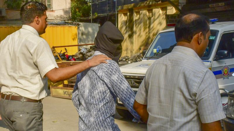 Mumbai: Crime Branch personnel take an accused in the Baba Siddiqui murder case to produce before the Esplanade court, in Mumbai, Wednesday, Nov. 6, 2024. (PTI Photo) Mumbai: Crime Branch personnel take an accused in the Baba Siddiqui murder case to produce before the Esplanade court, in Mumbai, Wednesday, Nov. 6, 2024. (PTI Photo)