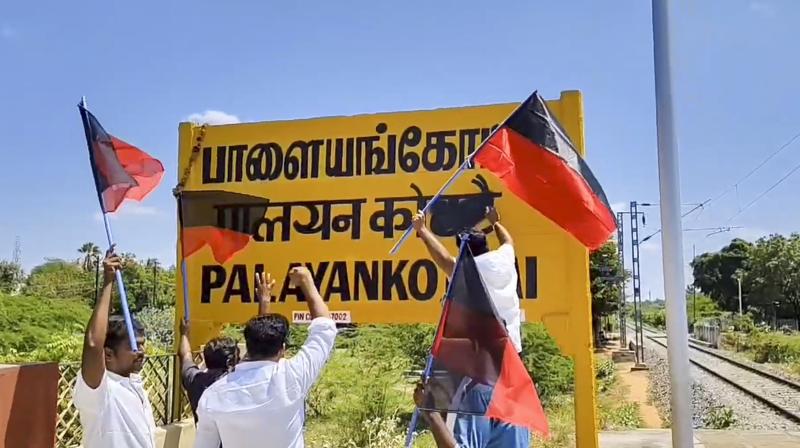 Tirunelveli: DMK workers protest against alleged Hindi imposition by blackening Hindi words on a board at a railway station, in Tirunelveli, Sunday, Feb. 23, 2025. (PTI Photo) Tirunelveli: DMK workers protest against alleged Hindi imposition by blackening Hindi words on a board at a railway station, in Tirunelveli, Sunday, Feb. 23, 2025. (PTI Photo)
