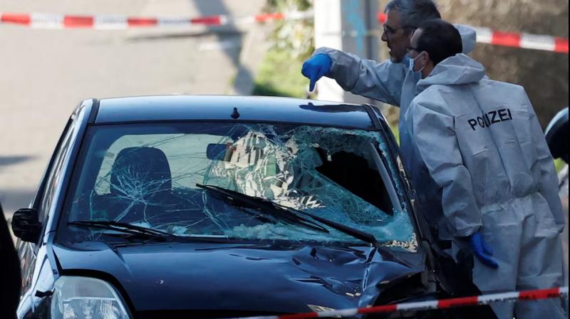 Police work at the site after a car drove into a crowd, in Mannheim, Germany. Police work at the site after a car drove into a crowd, in Mannheim, Germany.