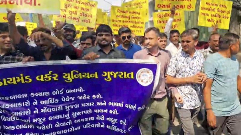 Diamond workers protest in Surat. Diamond workers protest in Surat.