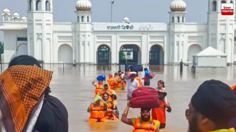 More Than 100 People Rescued in Kartarpur Sahib, Guru Granth Sahib Safe Latest News in Punjabi More Than 100 People Rescued in Kartarpur Sahib, Guru Granth Sahib Safe Latest News in Punjabi