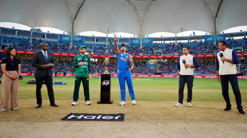 India's captain Suryakumar Yadav and Pakistan's captain Salman Agha at the toss before the start of the Asia Cup 2025 final match between India and Pakistan, in Dubai, UAE. (PTI Photo)