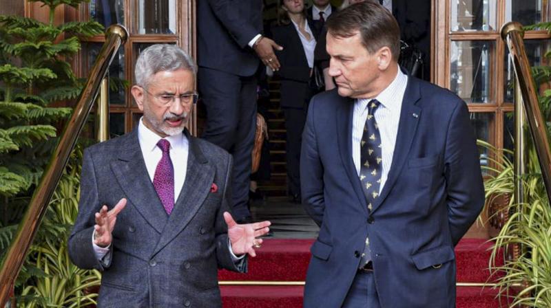 ਭਾਰਤ ਦੇ ਵਿਦੇਸ਼ ਮੰਤਰੀ ਐਸ. ਜੈਸ਼ੰਕਰ ਅਤੇ ਪੋਲੈਂਡ ਦੇ ਵਿਦੇਸ਼ ਮੰਤਰੀ ਅਤੇ ਉਪ ਪ੍ਰਧਾਨ ਮੰਤਰੀ ਰਾਦੋਸਵ ਸਿਕੋਰਸਕੀ। (Photo : PTI)