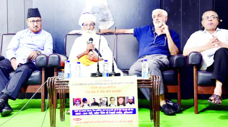 Baba Dharam Singh addressing  the seminar