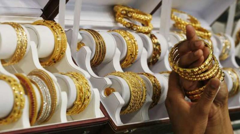 Gold price down by rs 80 and silver price rs 335 low