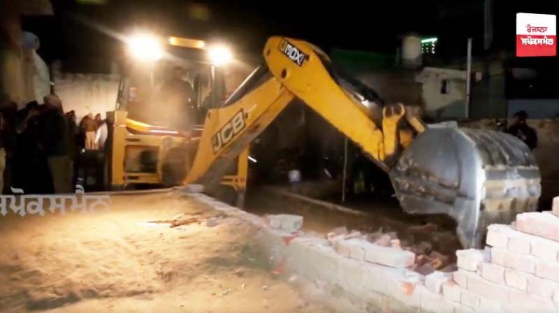 Bulldozer action at the house of a female drug smuggler who said, Bulldozer action at the house of a female drug smuggler who said,