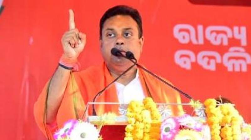 BJP nominee Sambit Patra croons Telugu song to woo voters in Puri BJP nominee Sambit Patra croons Telugu song to woo voters in Puri