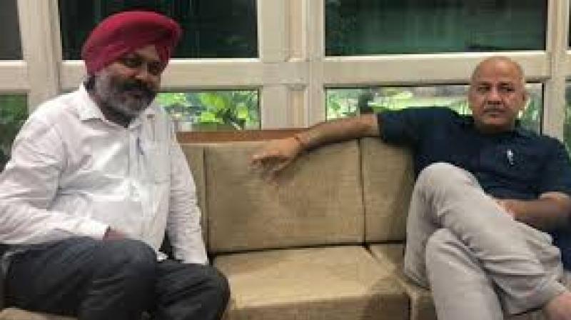 Harpal Cheema and Manish Sisodia Harpal Cheema and Manish Sisodia