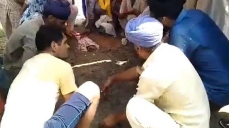 up pilibhit man gets electrocuted family bury him alive viral video up pilibhit man gets electrocuted family bury him alive viral video