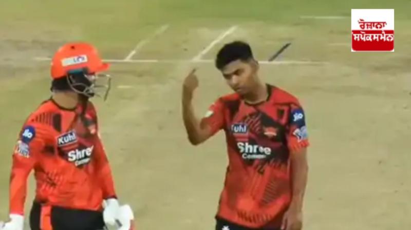 Zeeshan signals to get Ishan Kishan out and leave the field.