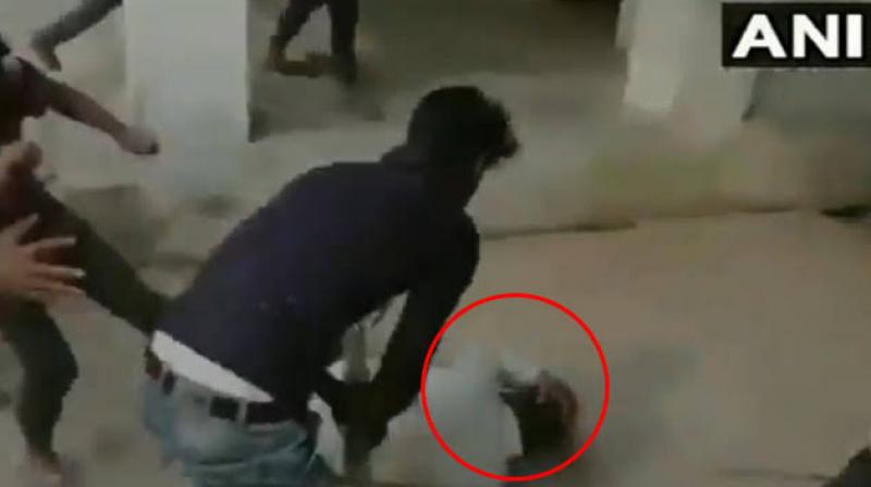 Students beat their own teacher Students beat their own teacher