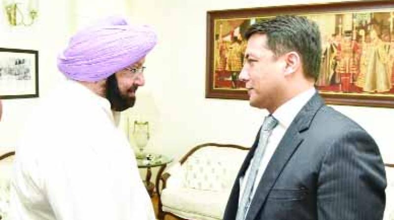 Captain Amarinder Singh and Farhod Rajiv Captain Amarinder Singh and Farhod Rajiv
