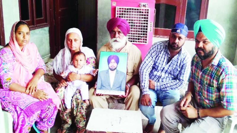 Gurjeet Singh Sarawan's family members interacting with journalists. Gurjeet Singh Sarawan's family members interacting with journalists.
