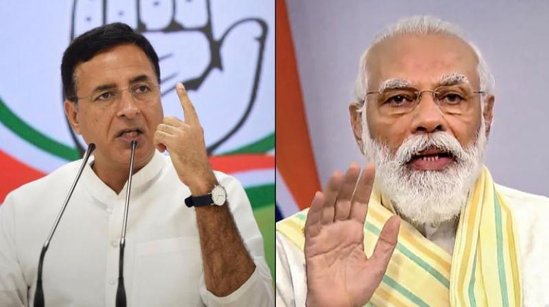 Randeep Surjewala and PM Modi