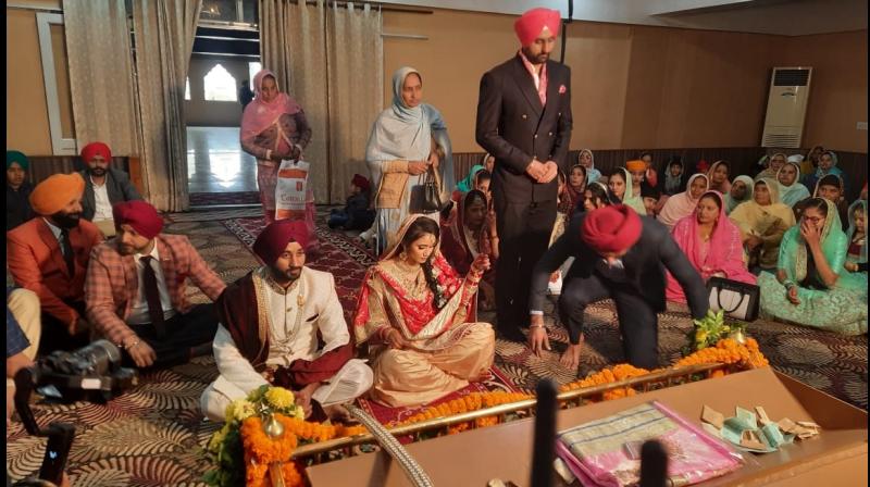 Indian Hockey captain Manpreet Singh marries Illi Siddique in Jalandhar Indian Hockey captain Manpreet Singh marries Illi Siddique in Jalandhar