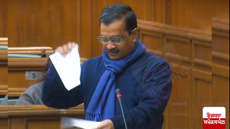 Arvind Kejriwal tore up copies of the centre's controversial farm law Arvind Kejriwal tore up copies of the centre's controversial farm law