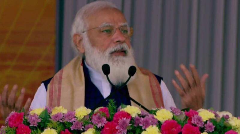 PM Modi distributes land allotment certificates in Assam