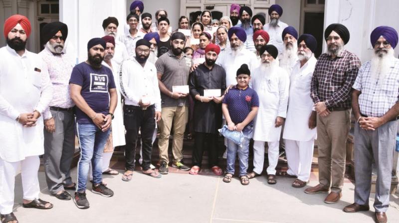 Shiromani Committee financial support to the families of Sikhs killed during an attack in Afghanistan Shiromani Committee financial support to the families of Sikhs killed during an attack in Afghanistan