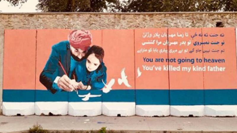 Kabul artists hit back with mural at terrorists who killed Sikhs