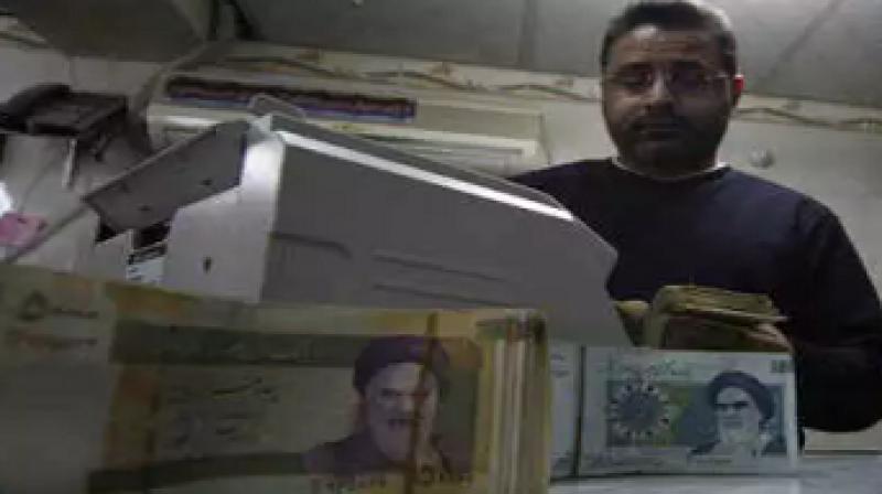 Iran's currency drops below 