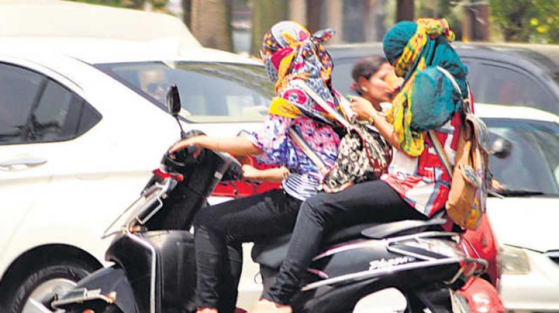 Covering faces while riding two-wheelers banned in Moga Covering faces while riding two-wheelers banned in Moga